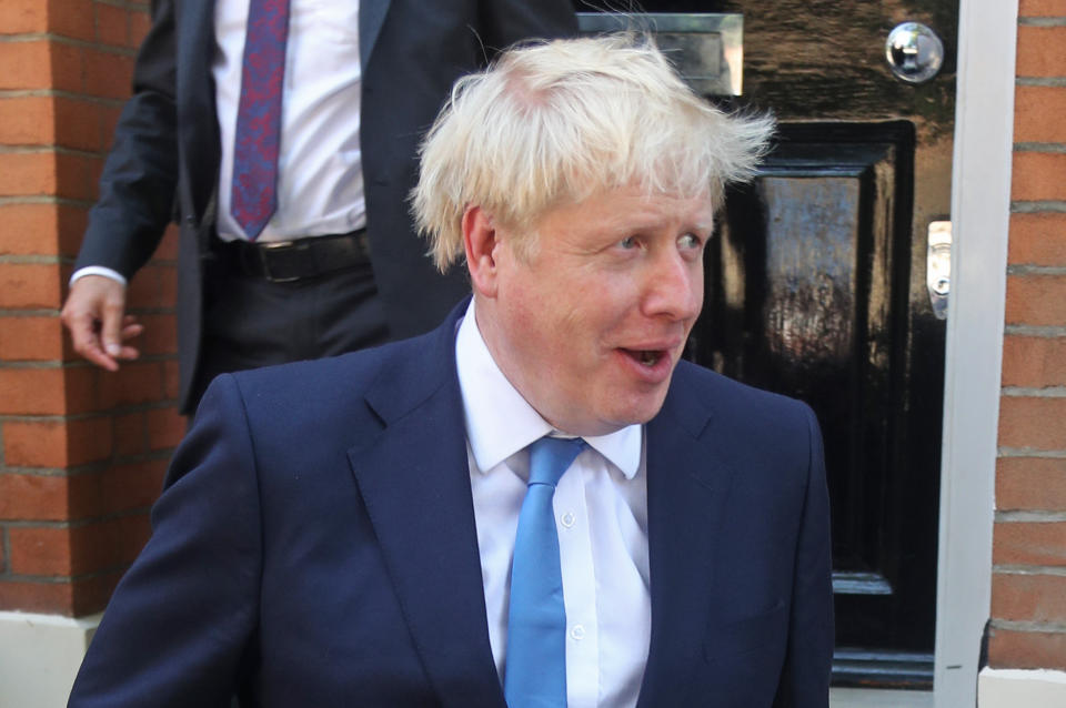 Newly elected leader of the Conservative party Boris Johnson leaves his office in Westminster, London, after it was announced that he had won the leadership ballot and will become the next Prime Minister.