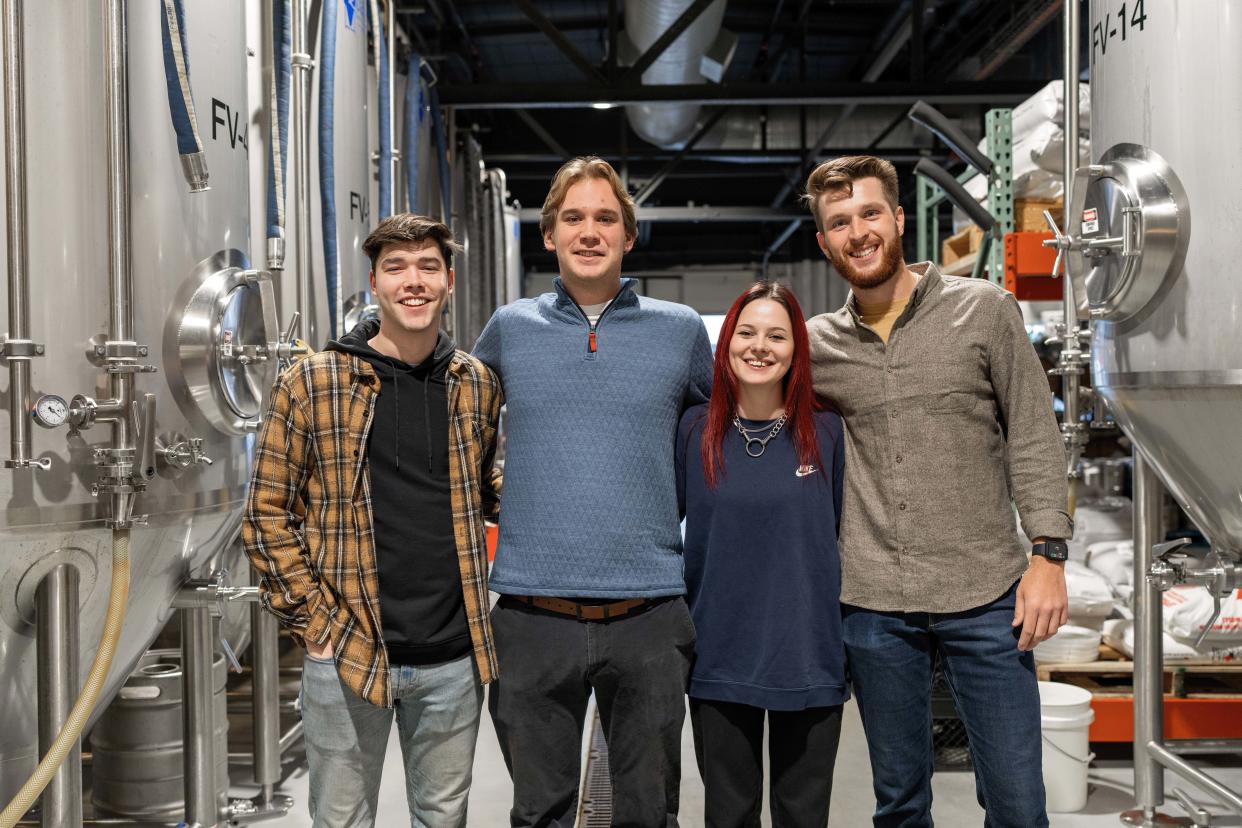 From left, Marquette University seniors Will Dales, Connor Nelson, Gracie Pionek and Jackson Cosgriff created a campus-themed beer with alumni who own local breweries.