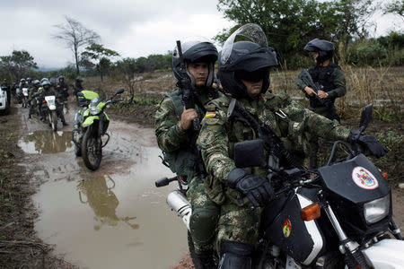 Colombian soldiers patrol during a military operation at the border with Venezuela in Cucuta, Colombia February 13, 2018. REUTERS/Carlos Eduardo Ramirez