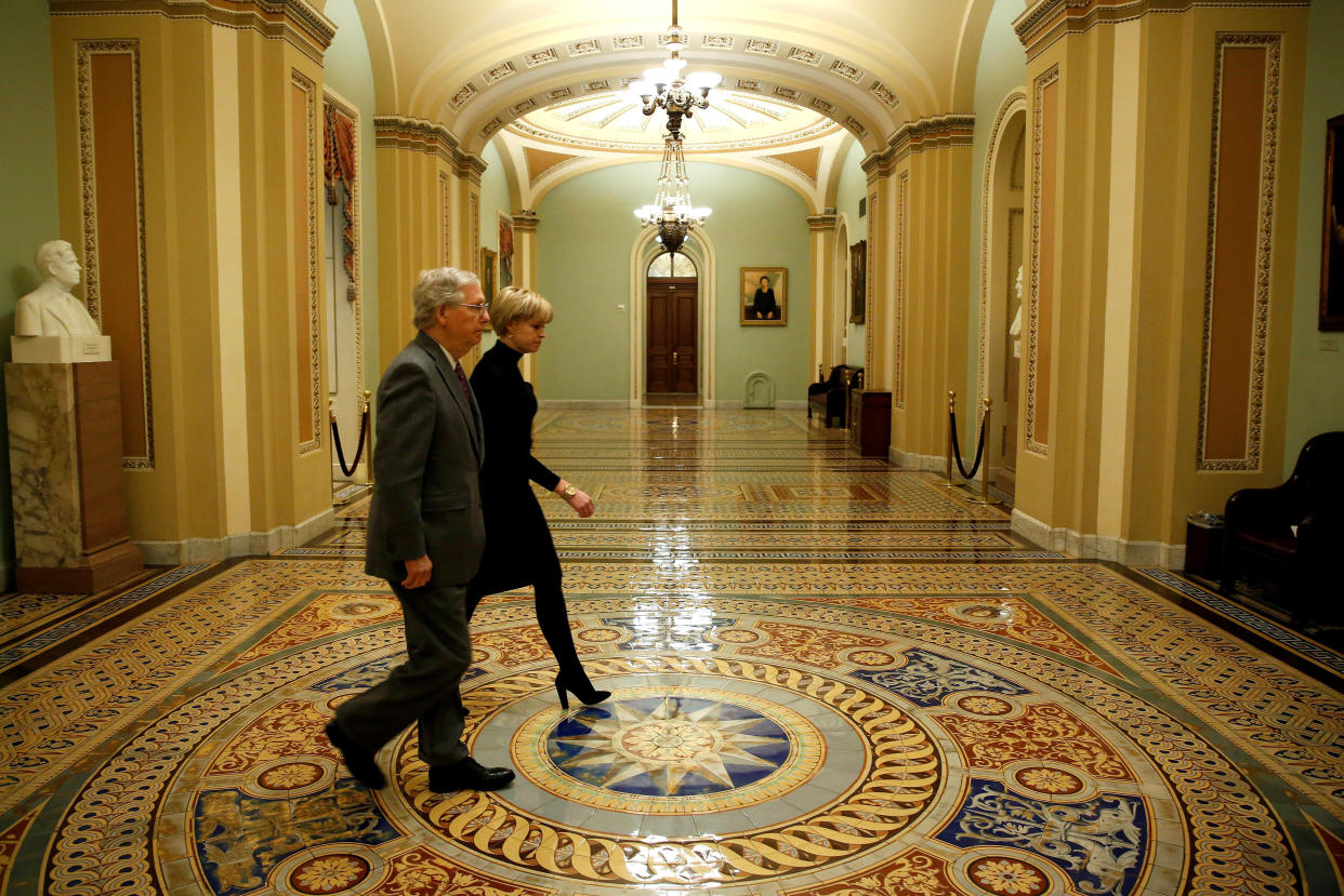 Senate Majority Leader Mitch McConnell (R-Ky.) walks to the Senate floor before a vote to end a government shutdown&nbsp;early Friday. (Photo: Joshua Roberts / Reuters)