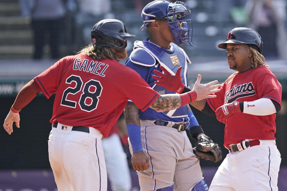 Cleveland Indians' Jose Ramirez, right, is congratulated by Ben Gamel after Ramirez hit a two-run home run in the eighth inning of a baseball game, Wednesday, April 7, 2021, in Cleveland. The Indians won 4-2. (AP Photo/Tony Dejak)