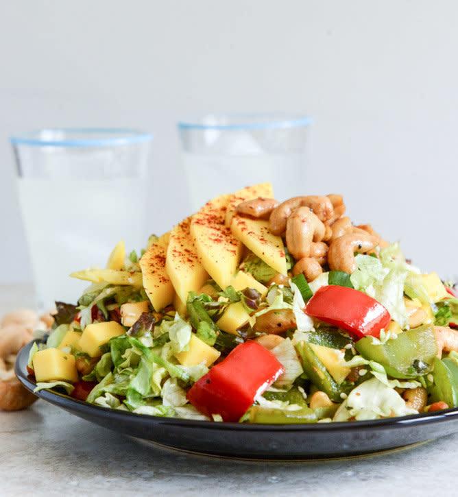 <strong>Get the <a href="http://www.howsweeteats.com/2013/08/cashew-chicken-chopped-salad-with-chili-dusted-mango/" target="_blank">Chopped Cashew Chicken Salad recipe</a> from How Sweet It Is</strong>