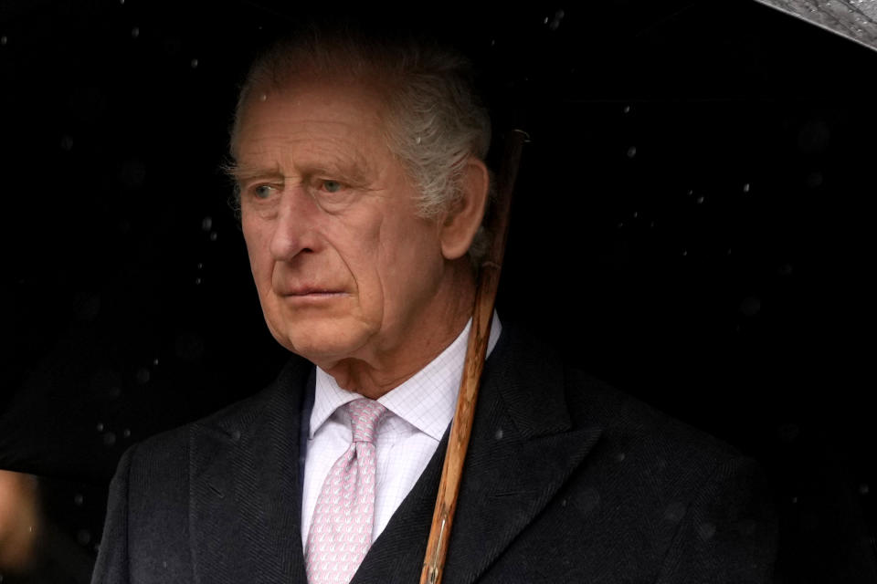 Britain's King Charles III arrives to lay a wreath of flowers at St. Nikolai Memorial in Hamburg, Germany, Friday, March 31, 2023. King Charles III arrived Wednesday for a three-day official visit to Germany. (AP Photo/Matthias Schrader)