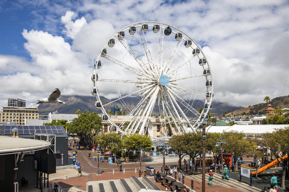 The popular tourist site the Victoria and Alfred (V&A) Waterfront district in Cape Town, South Africa, Friday March, 20, 2020. For most people the virus causes mild or moderate symptoms, but for others it causes severe illness. (AP Photo)