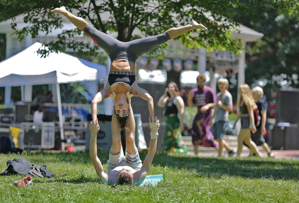 Don't be surprised to see ComFest attendees engaging in a wide range of activities you don't see every day, including AcroYoga.
