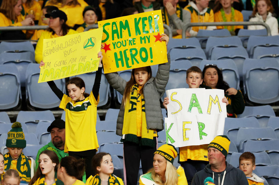 Young Australia fans hold up signs inside the stadium before a match between Australia and England. (REUTERS/Asanka Brendon Ratnayake)