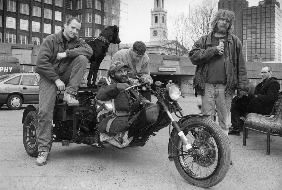 Zy with his new tricycle, specially made for him by Hells Angel friends and adapted for his special needs (Moyra Peralta/Courtesy of Bishopsgate Institute)