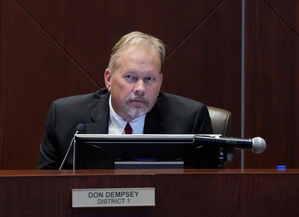 Volusia County Councilman Don Dempsey watches from the dais.