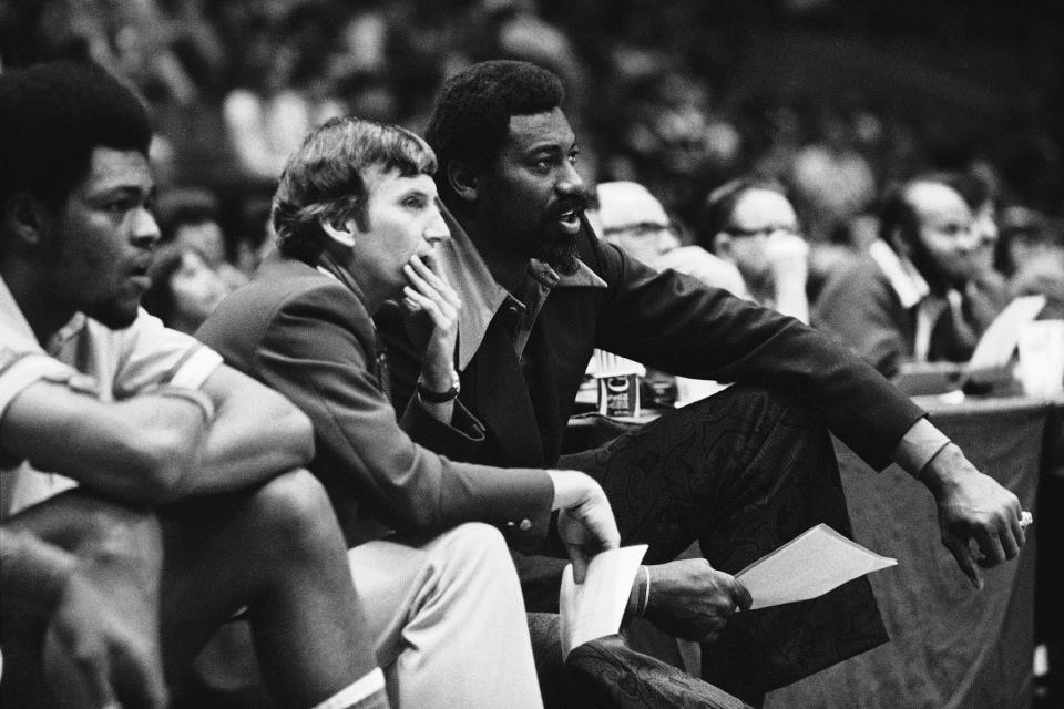 Wilt Chamberlain, right, coach, of the San Diego conquistadors, shares the enthusiasm of assistant coach Stan Albeck in 1979