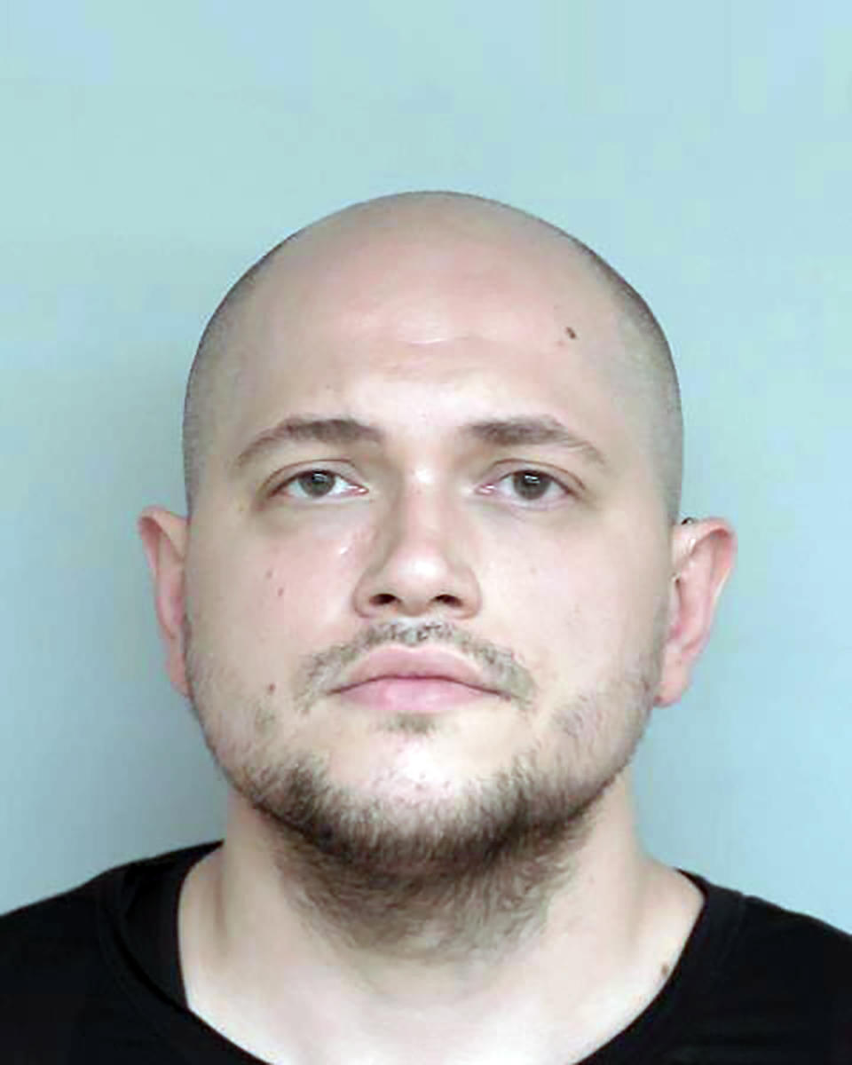 This booking photo provided by the Winona County, Minn., Detention Center shows Adam Fravel. Fravel, the former boyfriend of a Minnesota woman whose body was found hidden in a rural area of the state, was charged Friday, June 9, 2023. in her death. (Winona County Detention Center via AP)