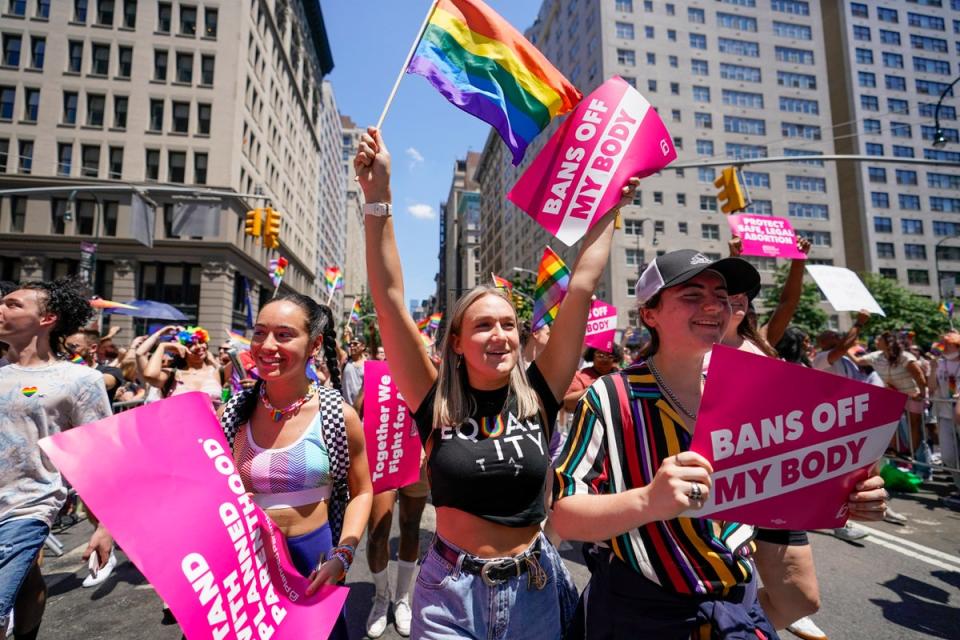 Revelers with Planned Parenthood march down Fifth Avenue during the annual NYC Pride March, on June 26, 2022, in New York. (Associated Press)