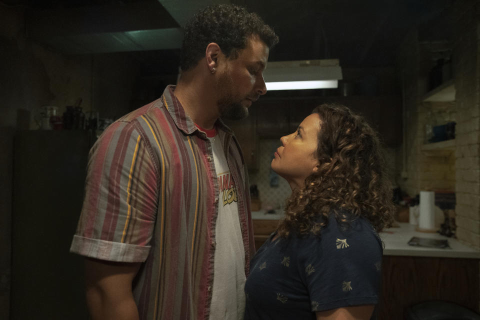 This image released by Amazon Prime Video shows Alejandro Hernandez, left, and Justina Machado in a scene from "The Horror of Dolores Roach." (Amazon Prime Video via AP)