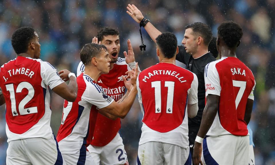 <span>Michael Oliver improving the entertainment at the Etihad.</span><span>Photograph: Jason Cairnduff/Action Images/Reuters</span>