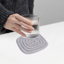 <p><strong>Walmart </strong></p><p>walmart.com</p><p><strong>$4.90</strong></p><p>These cotton coasters are hand-woven and heat-insulated, meaning their tabletop will be protected regardless of whatever they're drinking. There are four attractive colors to choose from, including light gray, dark gray, navy and beige.</p>