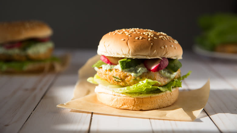 fish burger served on table