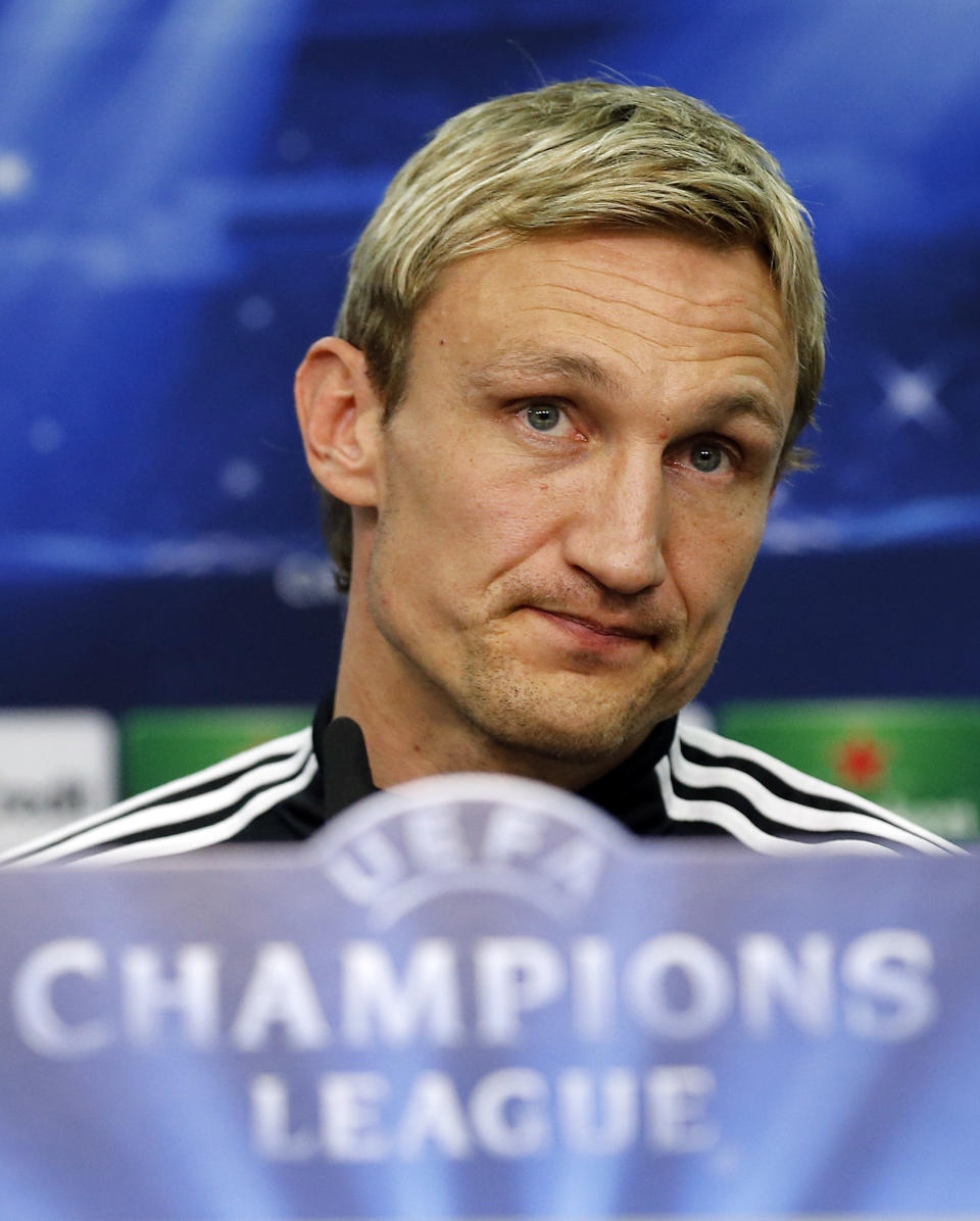 FILE - In this Feb. 17, 2014 file picture, Leverkusen head coach Sami Hyypia speaks during a press conference ahead of the Champions League round of the last 16 first leg soccer match between Bayer Leverkusen and Paris Saint-Germain in Leverkusen, Germany. Bayer Leverkusen fired Sami Hyypia as coach on Saturday April 5, 2014 after an alarming run that has put Champions League qualification in doubt. Youth coach Sascha Lewandowski has been put in charge to the end of the season. The Bundesliga club said in a statement that former Liverpool defender Hyypia was being released "with immediate effect" following Friday's 2-1 loss at relegation-threatened Hamburger SV. ( (AP Photo/Frank Augstein,File)