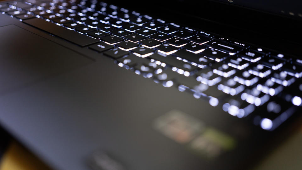 An HP Victus 15 laptop on a colourful table