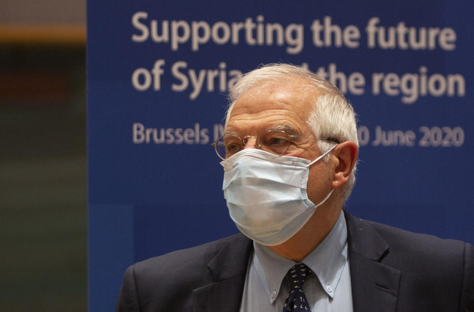 European Union foreign policy chief Josep Borrell waits for the start of a meeting, Supporting the future of Syria and the Region, in videoconference format at the European Council building in Brussels, Tuesday, June 30, 2020. (AP Photo/Virginia Mayo, Pool)