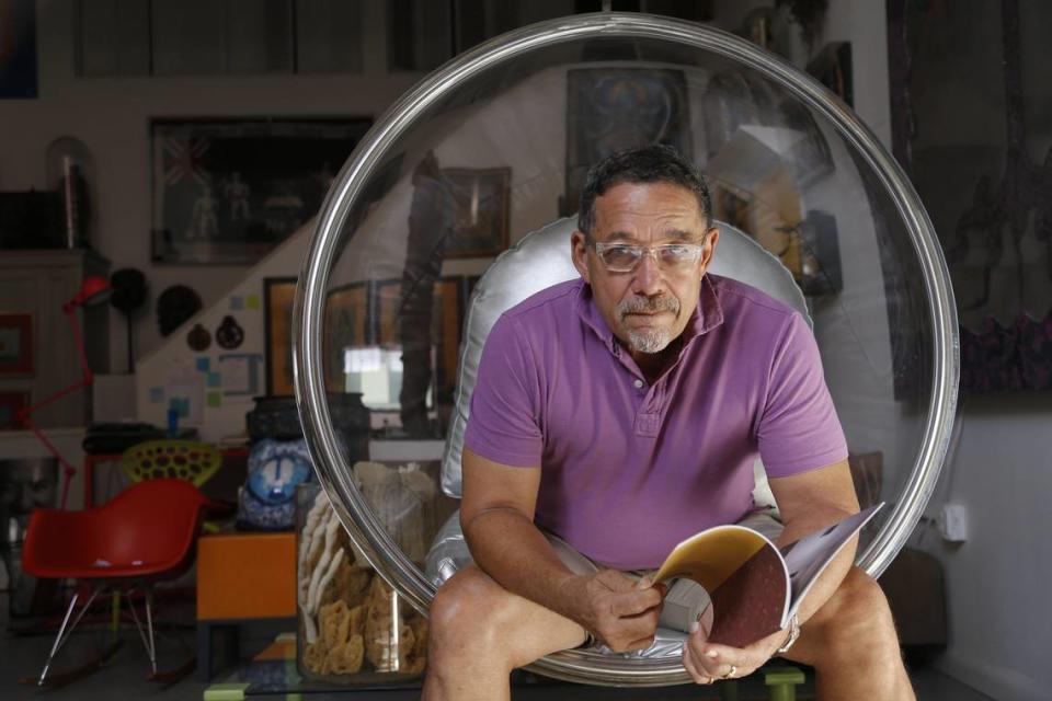 International renowned Haitian artist Edouard Duval-Carrie sits in his studio in Miami’s Little Haiti neighborhood. For the past five years, Duval-Carrie , artistic director of the Haitian Cultural Arts Alliance, has exhibited “Global Caribbean” inside the Little Haiti Cultural Center during Basel. The EDC Art Complex includes the non-profit Little Haiti Cultural Arts Alliance along with his studio. Little Haiti is an oasis with artists, restaurants, and local vendors whom have set-up shops creating an authentic Haitian cultural experiences for both locals and visitors alike.