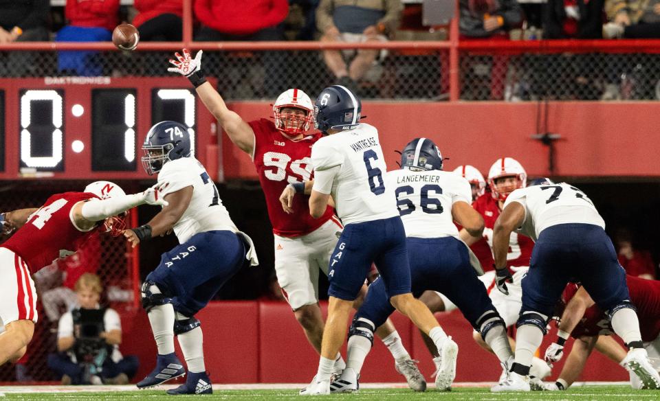 Nebraska defensive lineman Ty Robinson (99) reaches to block a pass from Georgia Southern quarterback Kyle Vantrease (6) during the first half on Sept. 10, 2022, in Lincoln, Nebraska.