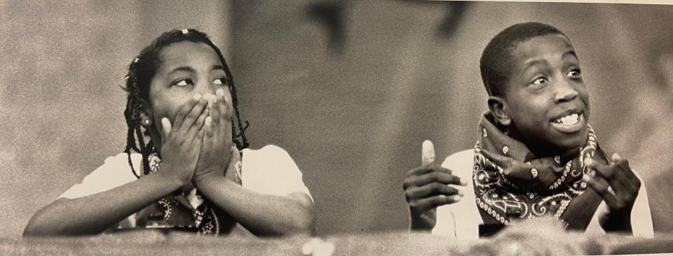 In February 1992, Deserae Wilson, 10, and Glenn Foreman, 11, were part of the Sallye B. Mathis Elementary School team taking part in the second annual Black History Month Brain Brawl at Gateway Mall. Here, they're barely able to hold back the answer to a bonus question presented to another team. The Sallye B. Mathis team ended up finishing second to Martin Luther King Elementary.