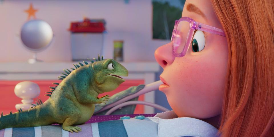 A lizard sits on the chest of a young girl as they look at each other in "Leo."