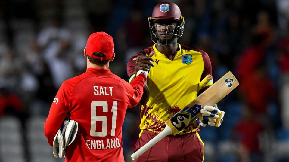 England's Phil Salt and West Indies' Jason Holder