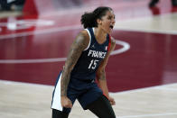 France's Gabrielle Williams (15) celebrates at the end of a women's basketball quarterfinal round game against Spain at the 2020 Summer Olympics, Wednesday, Aug. 4, 2021, in Saitama, Japan. (AP Photo/Charlie Neibergall)