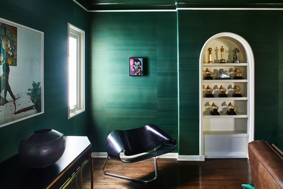 While most of the design and decor takes advantage of the light and airy nature of the house, Ronson wanted something a bit more cozy and perhaps sophisticated for his television room cum den. Looking to complement the vintage clubroom sofa already in the room, he opted for a Japanese silk wallpaper that mimics the look of malachite. All the better to showcase some of his many awards. “You would have to go through the whole house to get back around there,” Ronson explains, genuinely modest. “You’d really only see these if you were sitting and watching TV.” Does he have ambitions to fill that last shelf—a Tony, say, or an Emmy? “Hey, a boy can dream,” says Ronson.