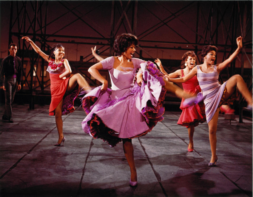 This photo provided by courtesy of MGM Home Entertainment shows Rita Moreno, center, as Anita, in the 1961 musical, "West Side Story." Moreno won an Academy Award as best supporting actress for her performance. Moreno is the 50th SAG Life Achievement recipient, to be honored at the Screen Actors Guild Awards, Saturday, Jan. 18, 2014, in Los Angeles. (AP Photo/Courtesy MGM Home Entertainment)