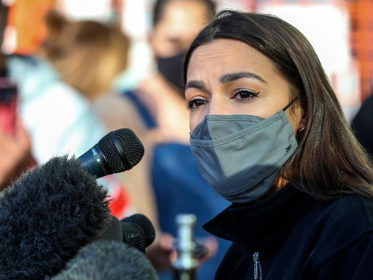 Alexandria Ocasio-Cortez speaks to the media at the Houston Food Bank  (Thomas Shea/AFP via Getty Images)