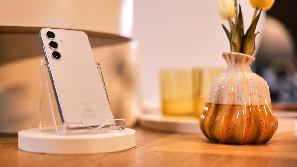 Samsung Galaxy S24 Plus phone on a wooden surface