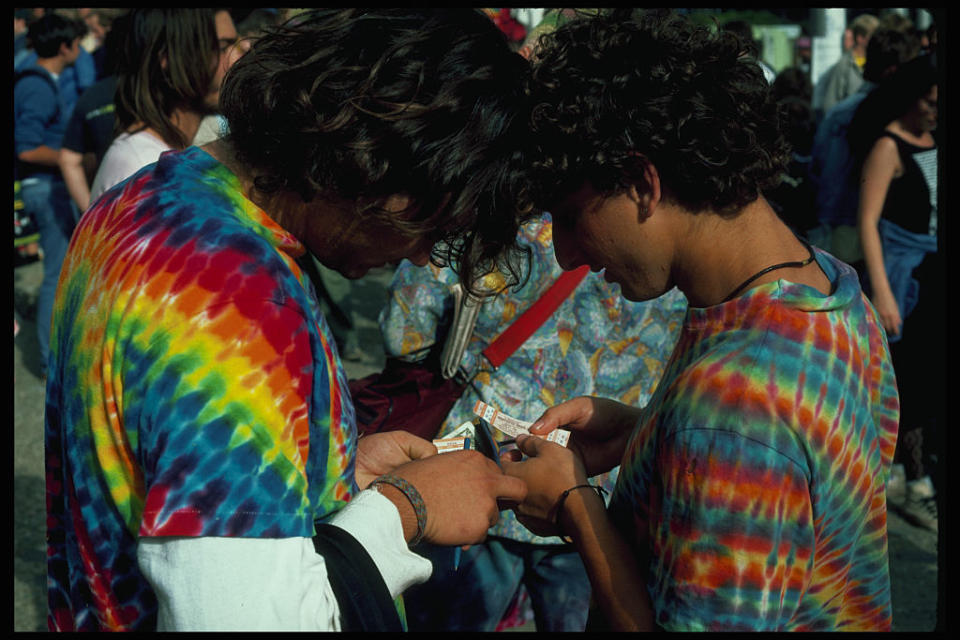 Tie-dye-plumed fans of the Grateful Dead, affectionately called Deadheads, before a show. (Photo by Philip Gould/Corbis via Getty Images)