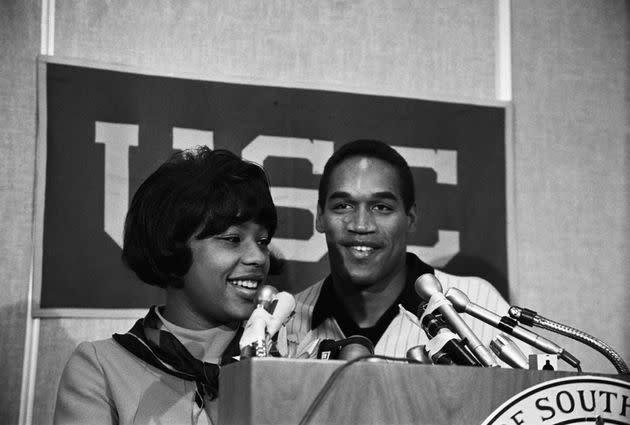 Simpson and his first wife, Marguerite Whitley, smile happily at a press conference after he was named winner of the 1968 Heisman Trophy. The following year, he was selected as the No. 1 overall NFL draft pick by the Buffalo Bills.