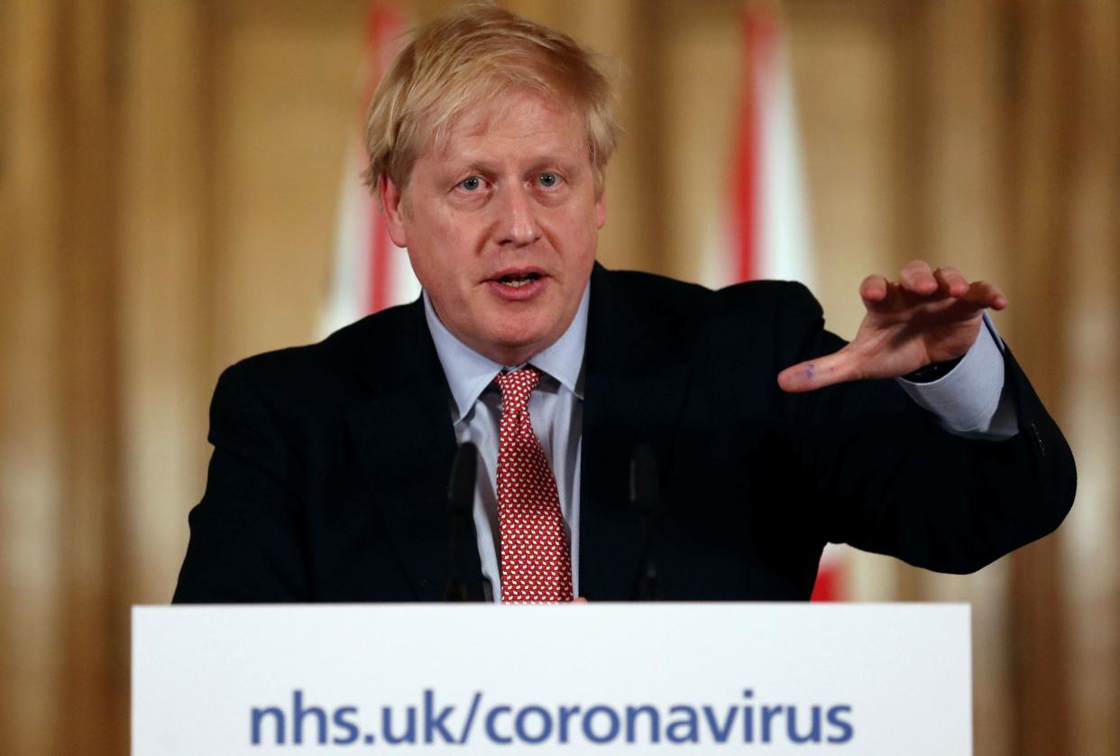 Britain's Prime Minister Boris Johnson speaks at a news conference addressing the government's response to the novel coronavirus COVID-19 outbreak, at 10 Downing Street in London on March 12, 2020. - Britain on Thursday said up to 10,000 people in the UK could be infected with the novel coronavirus COVID-19, as it announced new measures to slow the spread of the pandemic. (Photo by SIMON DAWSON / POOL / AFP) (Photo by SIMON DAWSON/POOL/AFP via Getty Images)