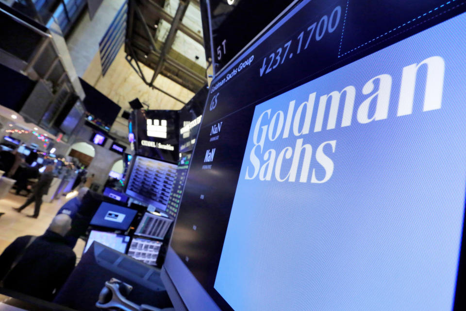The logo for Goldman Sachs appears above a trading post on the floor of the New York Stock Exchange on 13 December 2016. (Photo: AP)