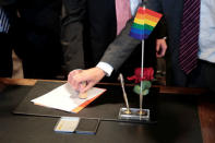 Same-sex couple Karl Kreil and Bodo Mende get married at a registry office, becoming Germany's first married gay couple after German parliament approved marriage equality in a historic vote this past summer, in Berlin, Germany October 1, 2017. REUTERS/Axel Schmidt