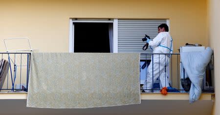 Police photographes a flat where the 27-year-old Syrian suspect lived, after an explosion in Ansbach near Nuremberg, Germany, July 25, 2016. REUTERS/Michaela Rehle