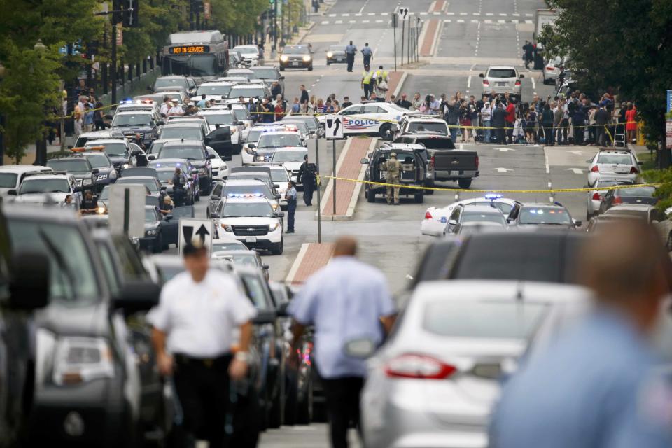 Police respond to reports of a shooting and subsequent lockdown at the U.S. Navy Yard in Washington