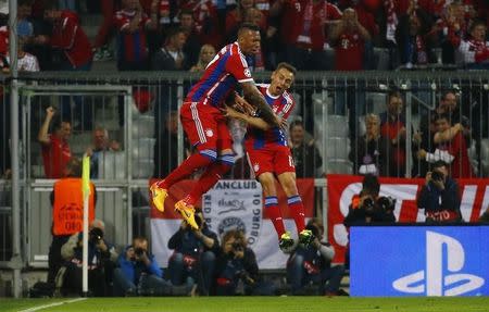 Football - Bayern Munich v Porto - UEFA Champions League Quarter Final Second Leg - Allianz Arena, Munich - Germany - 21/4/15 Bayern Munich's Jerome Boateng celebrates scoring their second goal. Reuters / Kai Pfaffenbach