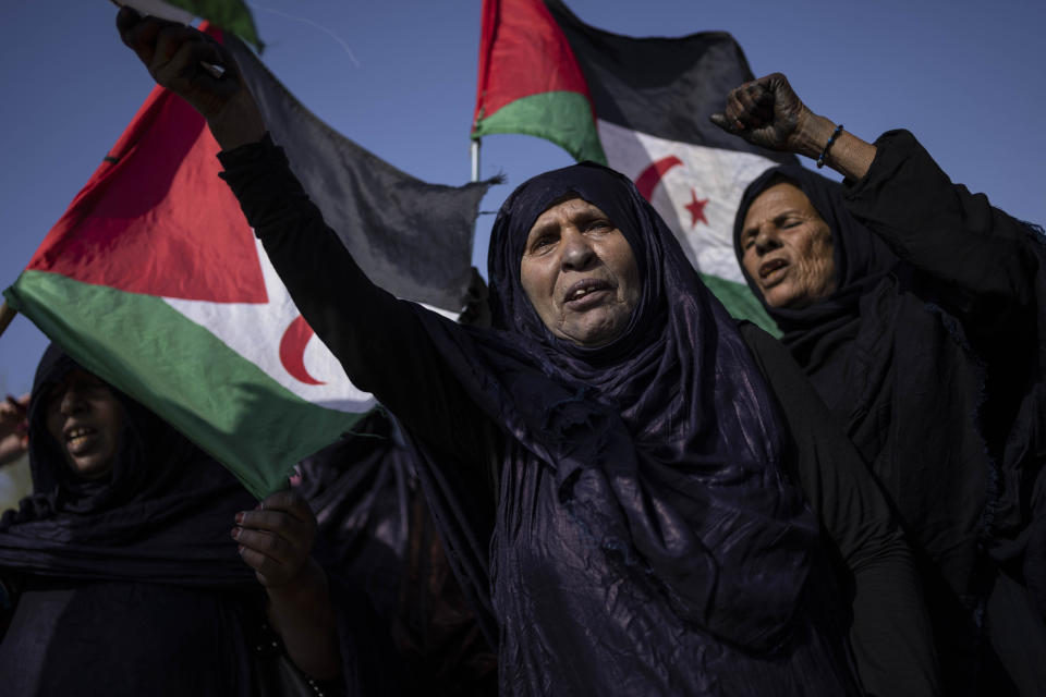 Saharaui refugees attend a rally prior their National Unity Day in the Bujador refugee camp, Algeria, Monday, Oct. 11, 2021. (AP Photo/Bernat Armangue)