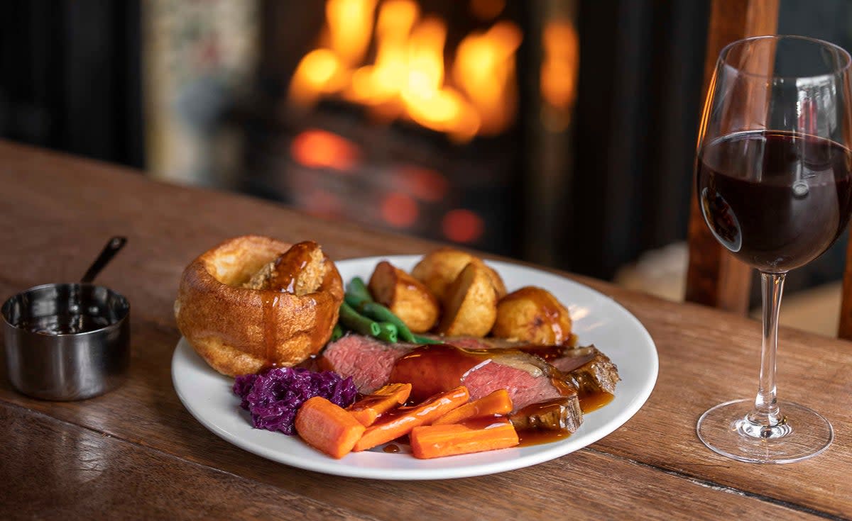Snuggles: nothing like a Sunday roast in a pub on a winter day (The Dog House )