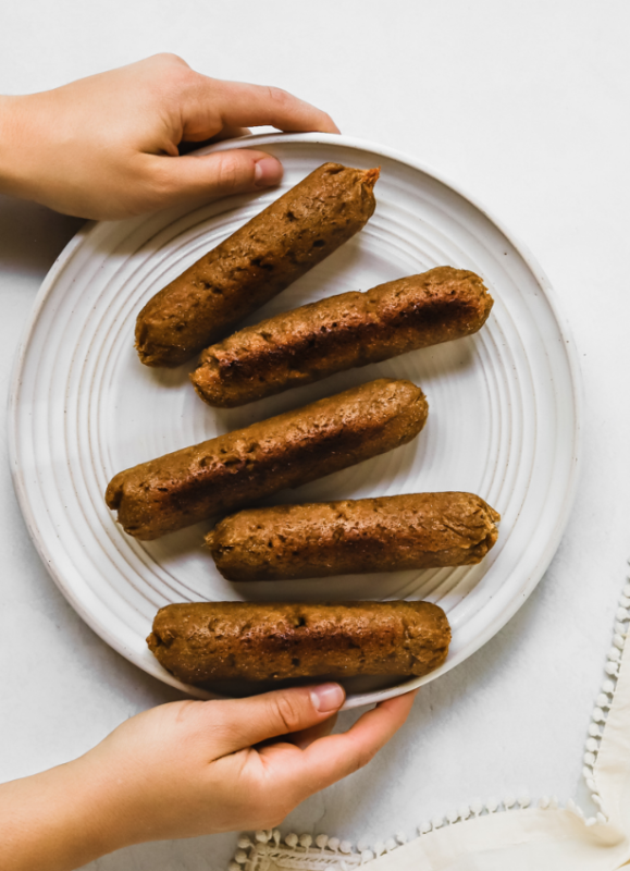 <p>Daughters of Seitan</p><p>These vegan seitan sausages are smoky, subtly sweet and super meaty. Serve these vegan sausages on a bun with your favorite toppings, cut them up to use in a dish, or eat them on their own. Approved by vegans, vegetarians and meat eaters!</p><p><strong>Get the recipe: <a href="https://daughterofseitan.com/apple-sage-seitan-sausages/" rel="nofollow noopener" target="_blank" data-ylk="slk:Apple Sage Seitan Sausages;elm:context_link;itc:0;sec:content-canvas" class="link rapid-noclick-resp">Apple Sage Seitan Sausages</a></strong></p>