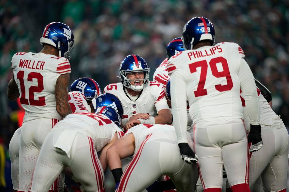 New York Giants' Tommy DeVito plays during an NFL football game, Monday, Dec. 25, 2023, in Philadelphia. (AP Photo/Matt Slocum)