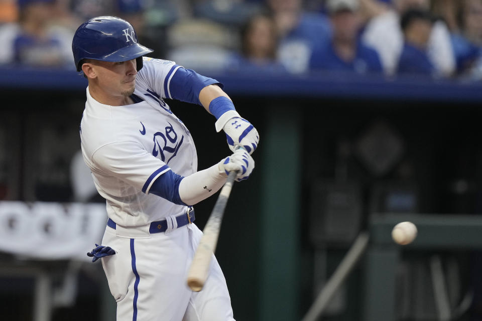 Kansas City Royals' Drew Waters hits an RBI triple during the fourth inning of a baseball game against the Detroit Tigers Tuesday, July 18, 2023, in Kansas City, Mo. (AP Photo/Charlie Riedel)