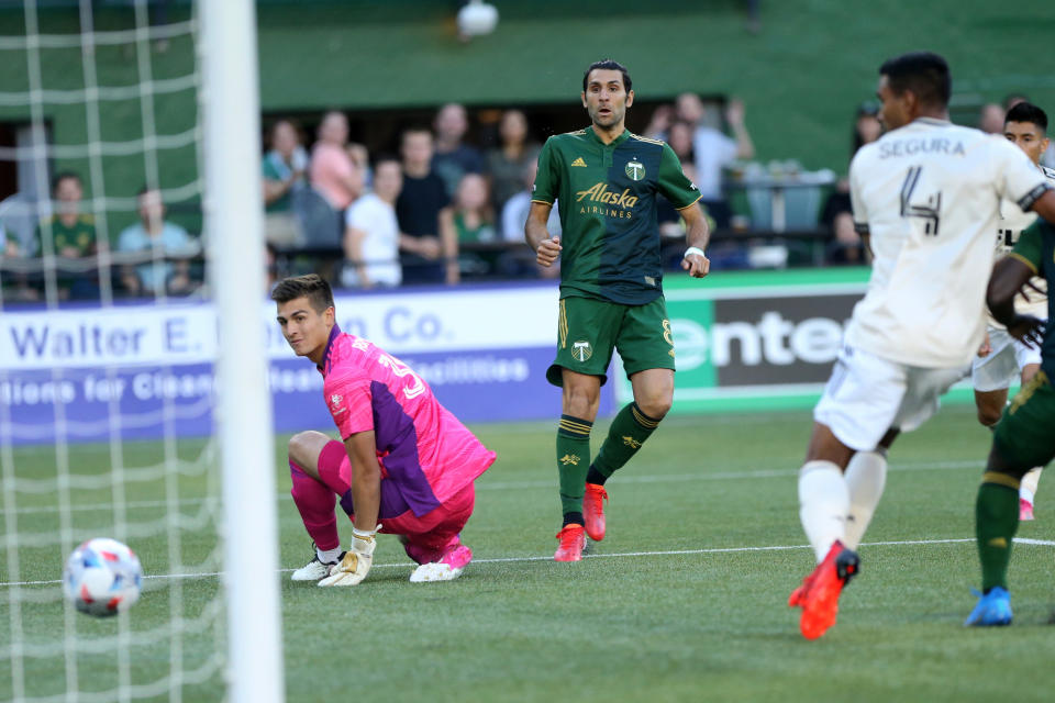 Portland Timbers midfielder Diego Valeri (8) scores his 100th MLS goal, early in the first half against Los Angeles FC during an MLS soccer match Wednesday, July 21, 2021, in Portland, Ore. (Sean Meagher/The Oregonian via AP)