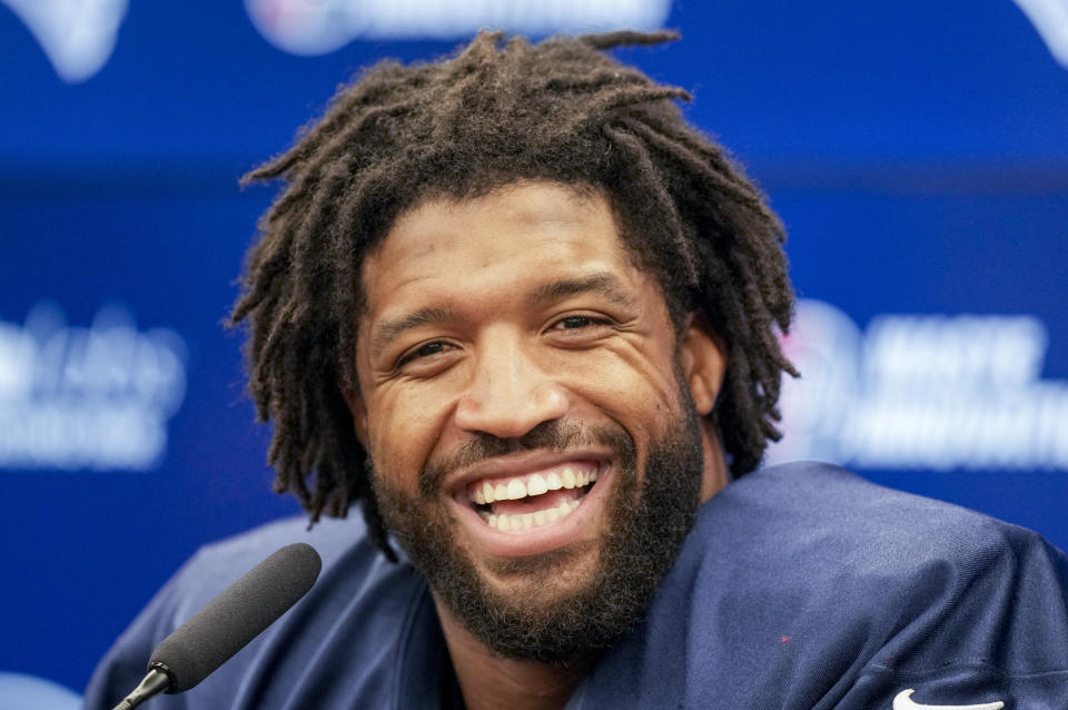 New England Patriots Deatrich Wise Jr. attends a press conference in Frankfurt, Germany, Friday, Nov. 10, 2023. The New England Patriots will play against the Indiana Colts in a NFL game on Sunday. (AP Photo/Michael Probst)