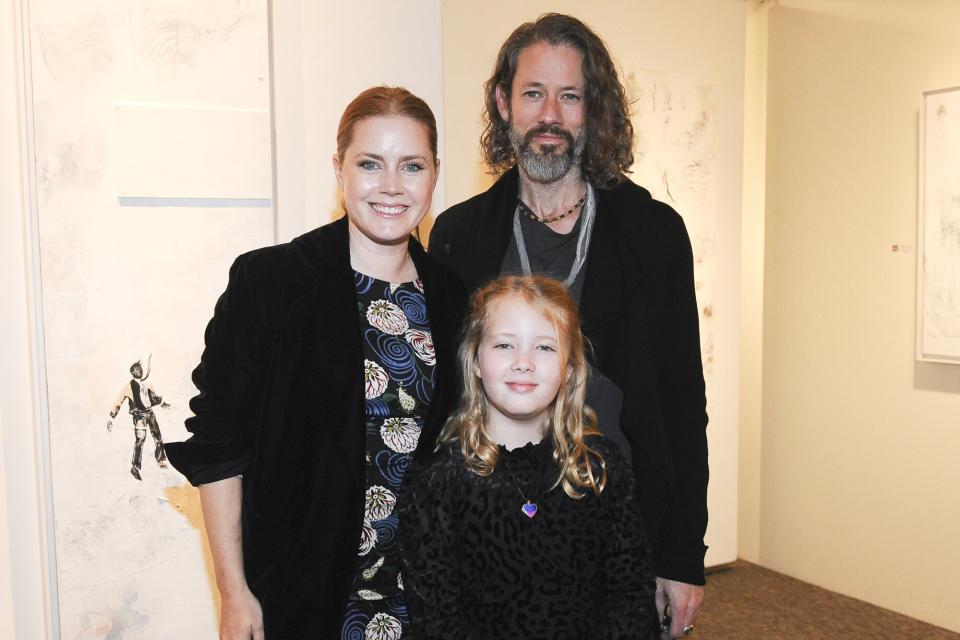 Amy Adams, Darren Legallo and Aviana Legallo attend the Trigg Ison Fine Art In Association With Krista Smith And Sam Taylor-Johnson Present Darren Legallo "From Destruction" event on January 10, 2020 in West Hollywood, California.