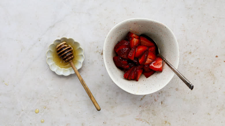 Bowl of honey macerated strawberries