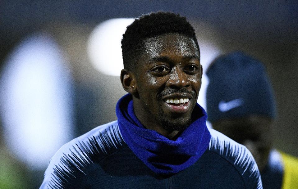 Ousmane Dembele needs to ‘concentrate more’, his Barcelona teammate Luis Suarez says (AFP Photo/FRANCK FIFE)